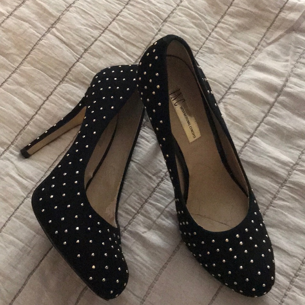 Black suede heels with gold